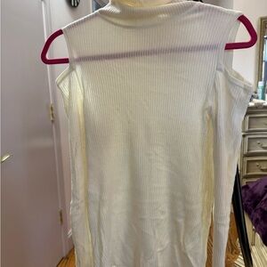 Sleeveless Ribbed Turtleneck Top